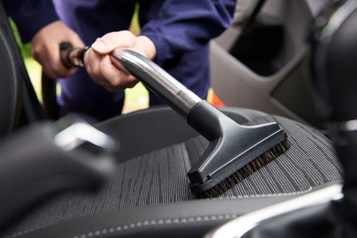 Vacuuming Seats,